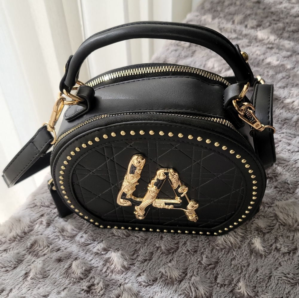 crossbody/handbag purse zippered and studded